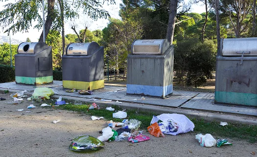 Commercial waste collection on site in daylight.