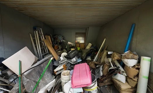 Hoarder and sensitive clearances on site in daylight.
